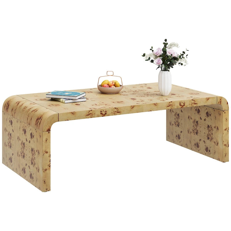 Table basse en loupe de cuir arquée
