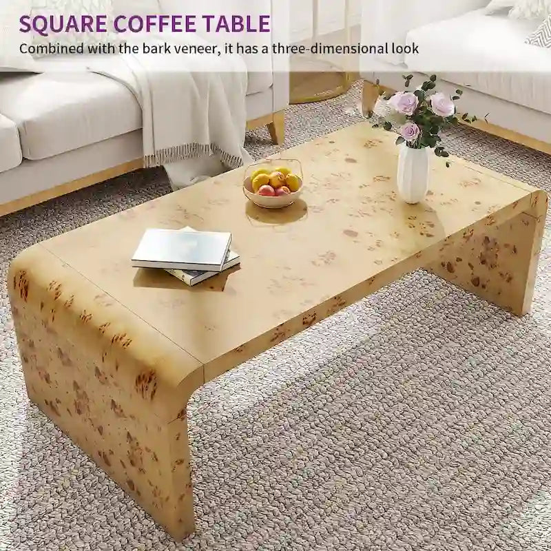 Table basse en loupe de cuir arquée